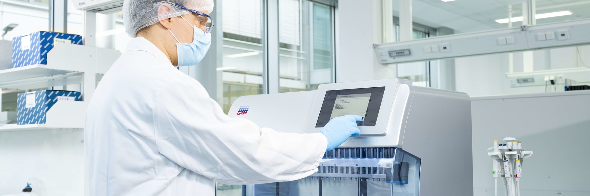 a scientist operating an HID machine